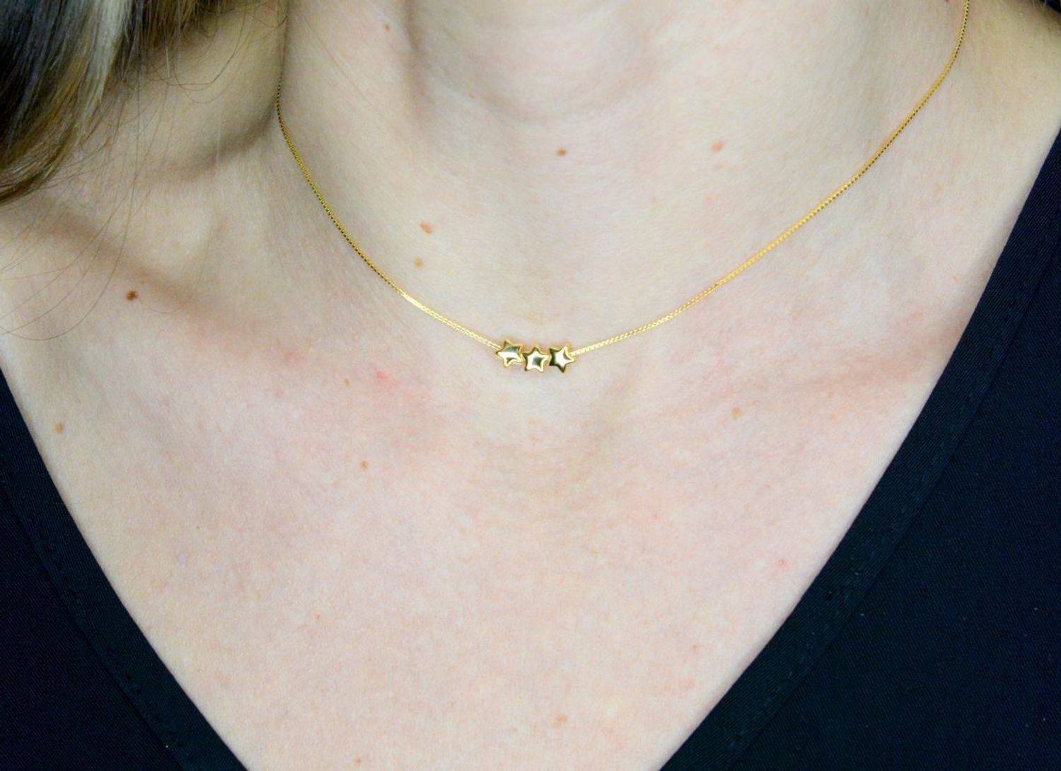 Naszyjnik damski srebrny pozłacany z trzema gwiazdkami Armonica Nomination 241305 009.png